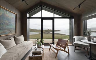 Hvammsvik Nature Resort's Artist Lodge overlooks a fjord in West Iceland.