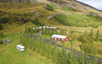 Fljotsdalsgrund is a tranquil retreat surrounded by the enchanting landscapes of Fljotsdalur.
