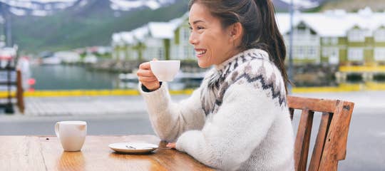 Traveler in Iceland sipping coffee.jpg