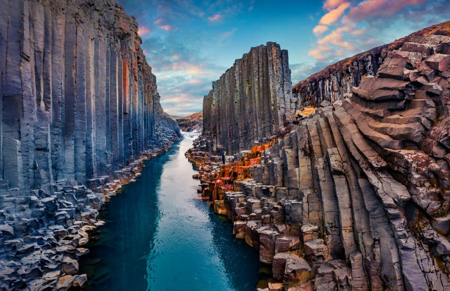 Studlagil Canyon with basalt columns and blue river in East Iceland
