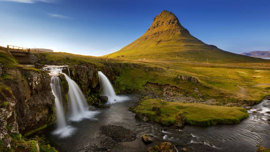 Kirkjufell mountain and waterfall in Iceland during summer