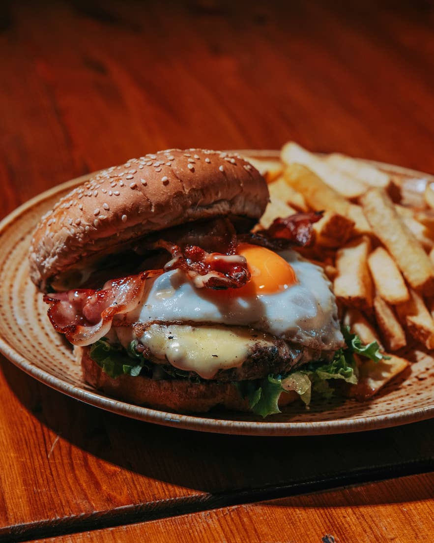 A farm-fresh Icelander Burger with fries at Efstidalur II, a working cattle farm restaurant on the Golden Circle in Iceland.