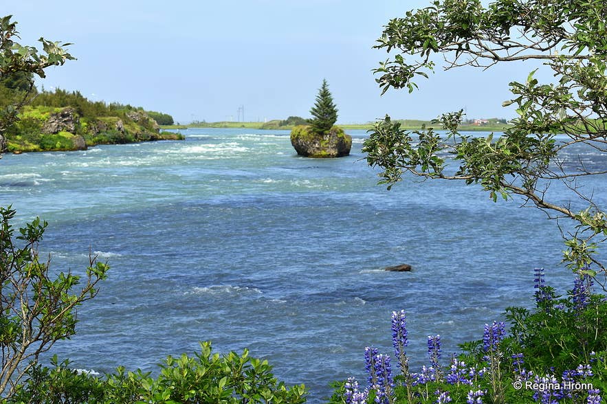 Joruklettur rock in the Olfusa River near Selfoss linked to the Icelandic giantess Jora folklore legend
