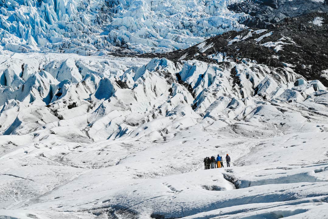 Rugged ice ridges of Falljokull Glacier rise on a glacier hike from Skaftafell.