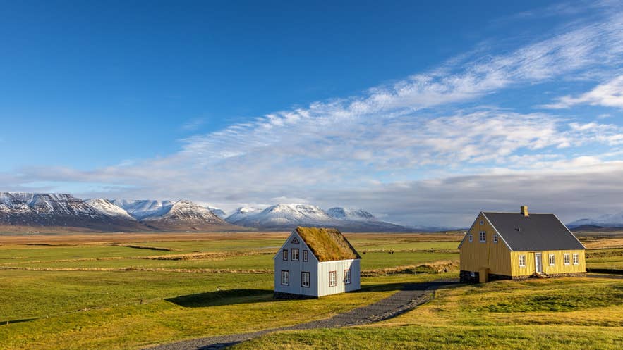 Traditional turf-roofed houses at Glaumbaer Turf Farm and Museum in North Iceland.