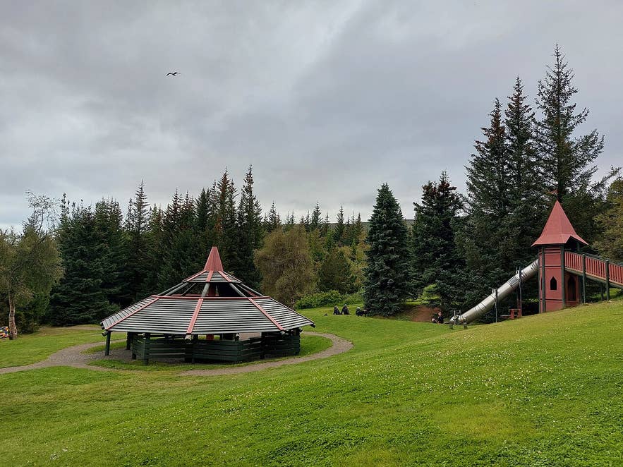 Kjarnaskógur Forest pavilion and playground in Akureyri, linked to Naustaborgir hiking area amid tall evergreens. Kjarnaskógur Forest pavilion and playground in Akureyri, linked to Naustaborgir hiking area amid tall evergreens.