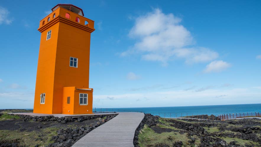 Sunny view of Svortuloft Lighthouse on Iceland's Snaefellsnes Peninsula near the August 12, 2026 eclipse path