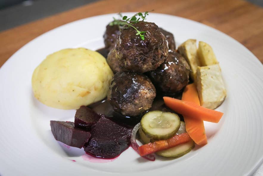 Langaholt Restaurant meatballs with mashed potatoes, root vegetables, and pickled vegetables in Snaefellsnes Peninsula, Iceland