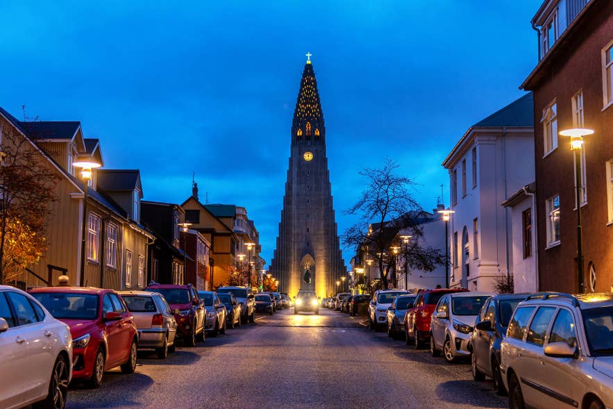Street parking signs and cars along Laugavegur Street in central Reykjavik.