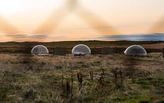 The view of three of the Aurora Igloos from inside one of the pods.