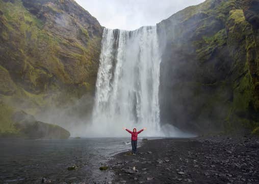 11 Hour South Coast Tour with Glacier Hiking, Waterfalls & Black Sands with Transfer from Reykjavik