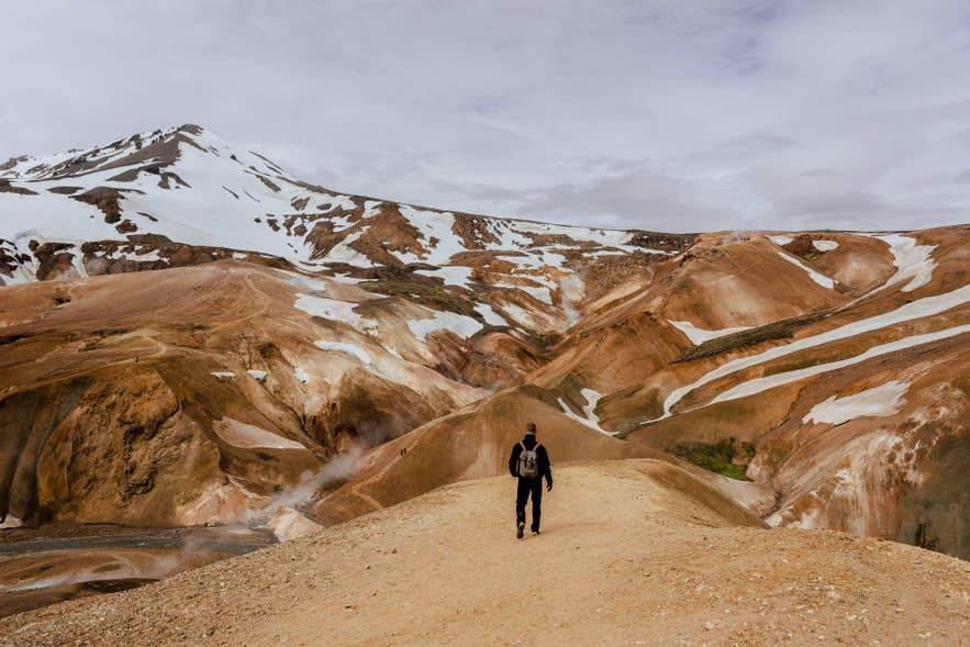 Hiker in Iceland's remote Highlands, the kind of area where mobile signal drops and offline maps matter