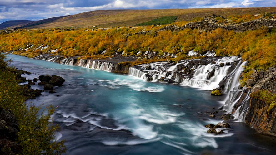 Hraunfossar Waterfalls in West Iceland, a scenic stop with reliable mobile coverage.