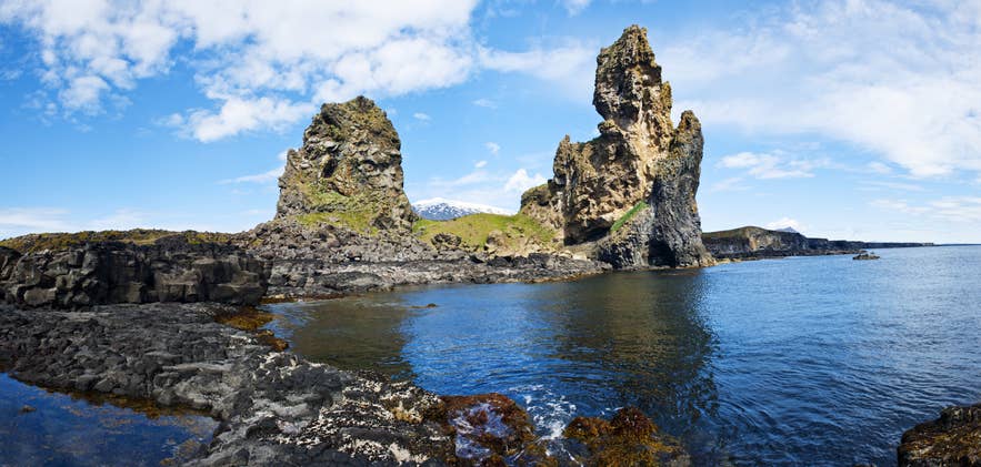 Rugged rock formations along the Snaefellsnes coast, a common stop on Snaefellsjokull day tours.