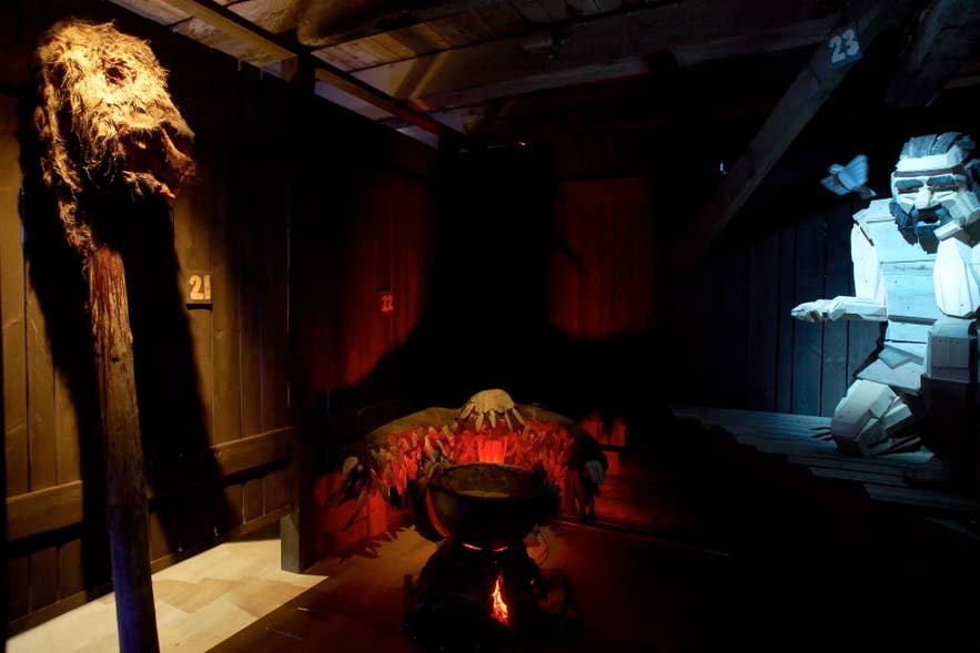 Carved wooden figures inside the Egil's Saga exhibition at the Settlement Center in Borgarnes.