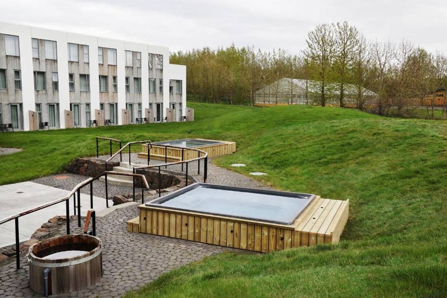Fosshotel Reykholt with its outdoor hot tubs, in the center of the village.