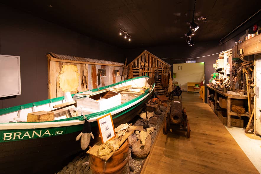 The 1913 six-oar rowboat Brana on display among fishing gear at the Grundarfjordur Saga Centre.