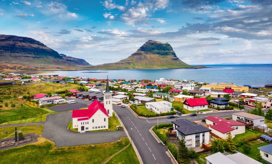 Aerial view of Grundarfjordur town and its church on the Snaefellsnes coast, with Kirkjufell across the bay..