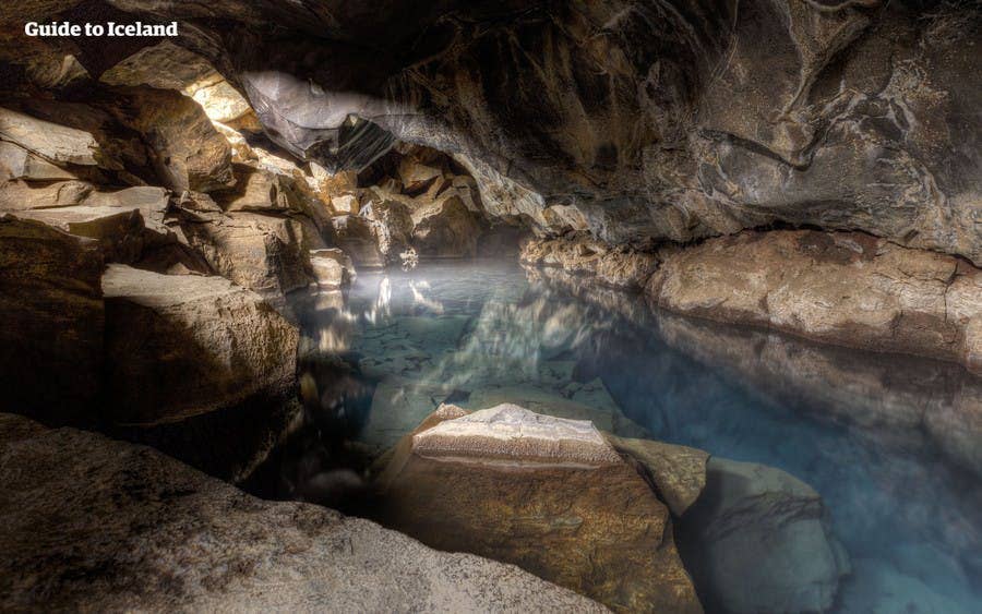 The vivid blue hot spring hidden inside Grjótagjá lava cave near Lake Mývatn, North Iceland.