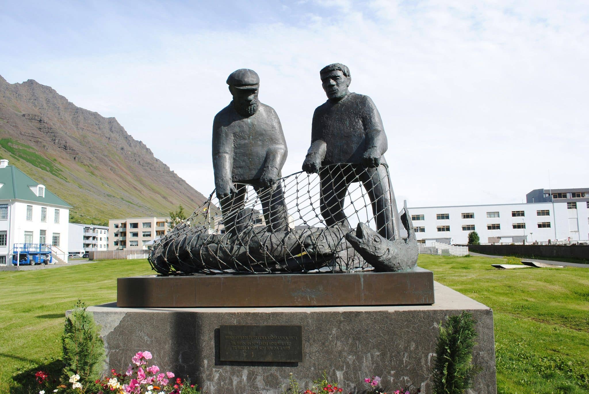 A memorial statue to fishermen stands in the town of Ísafjörður in the Westfjords of Iceland.