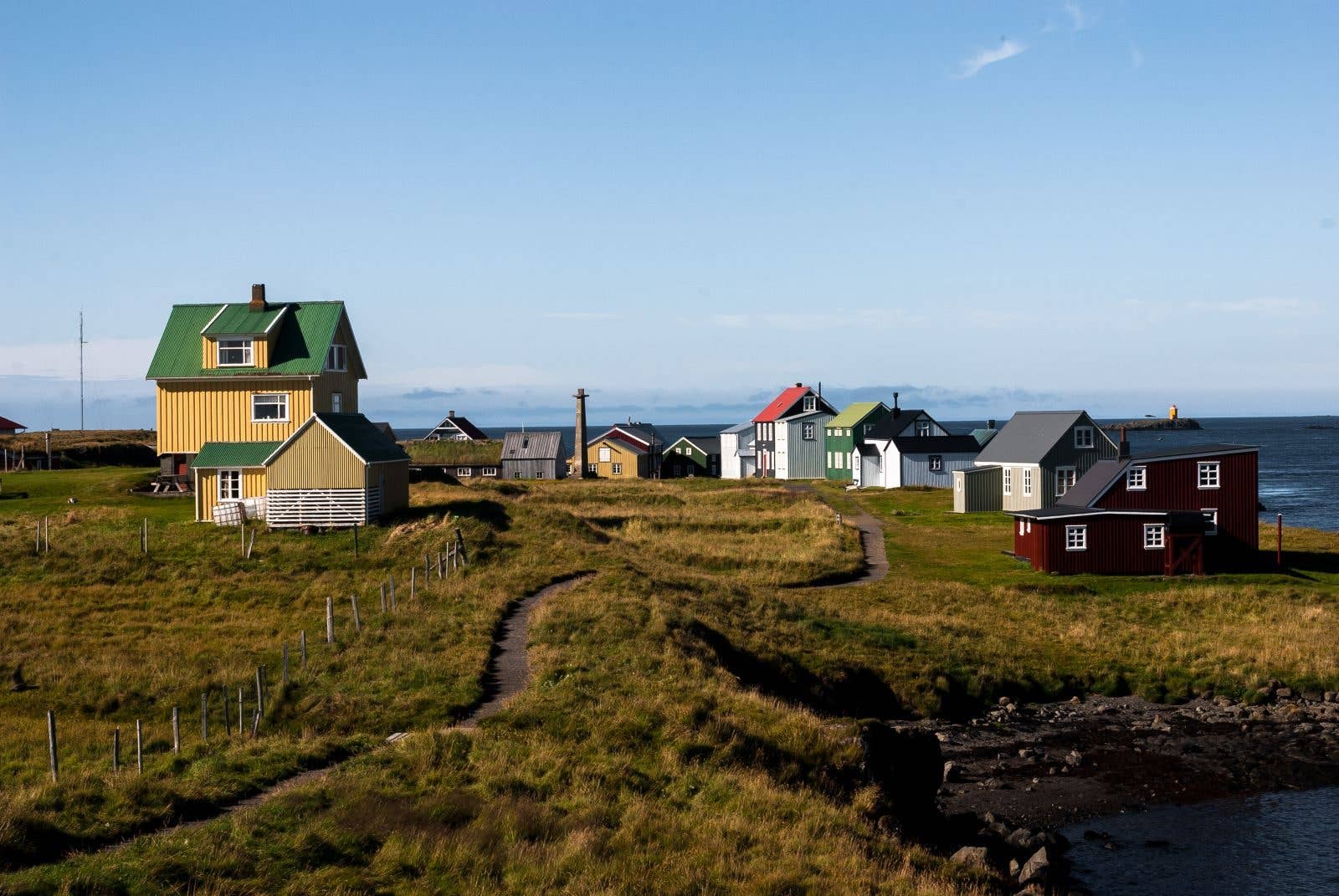 Colourful old houses cluster on the tiny island of Flatey in Breiðafjörður, West Iceland.