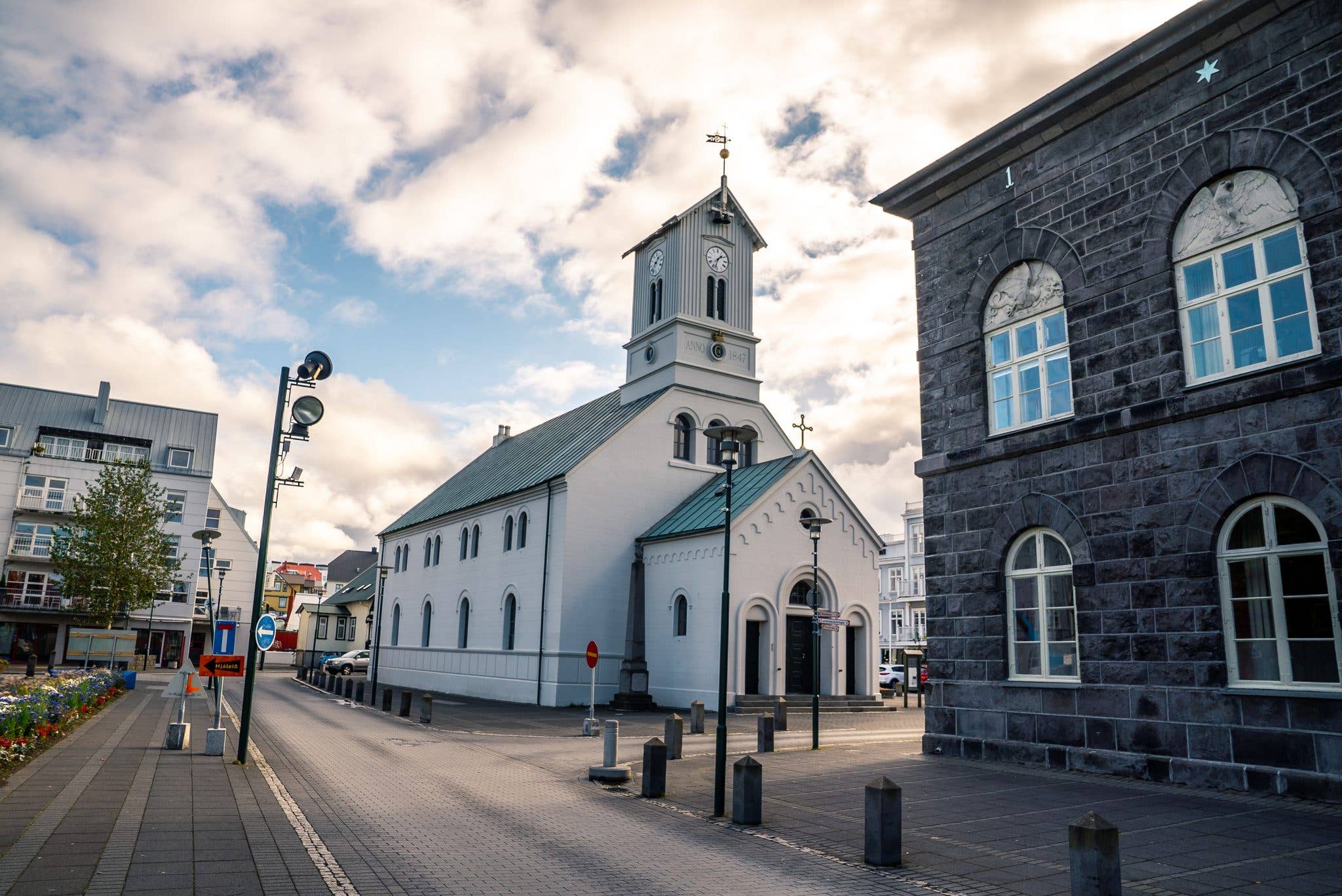 The Alþingishúsið parliament house and Dómkirkjan cathedral stand in the old centre of Reykjavík, Iceland.