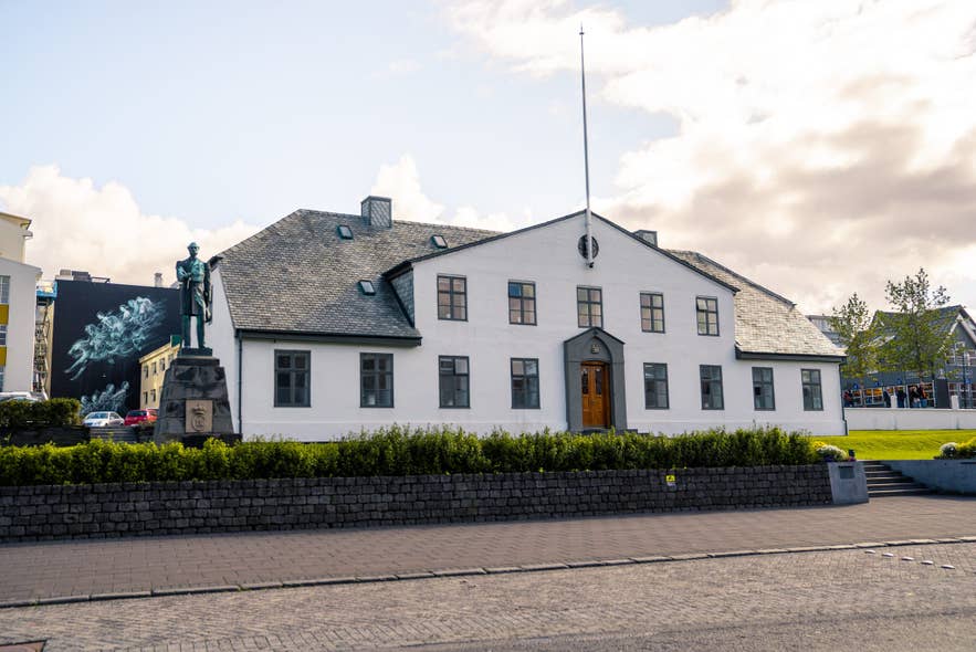 Government House in Reykjavík with Einar Jónsson's bronze statue of King Christian IX on the lawn Government House in Reykjavík with Einar Jónsson's bronze statue of King Christian IX on the lawn