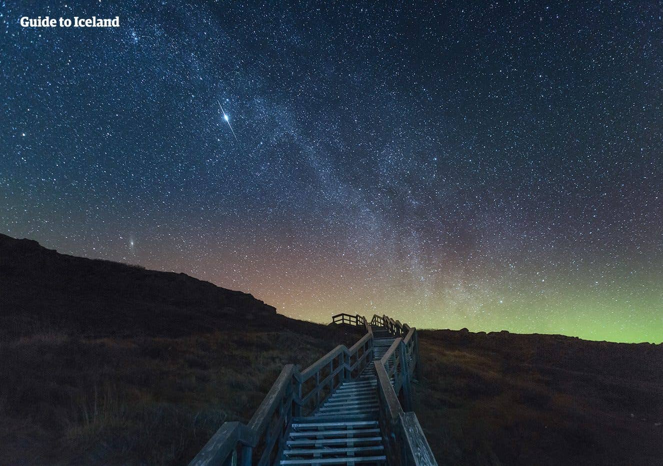 A starry sky arches over the Gullfoss waterfall on the Golden Circle in South Iceland.