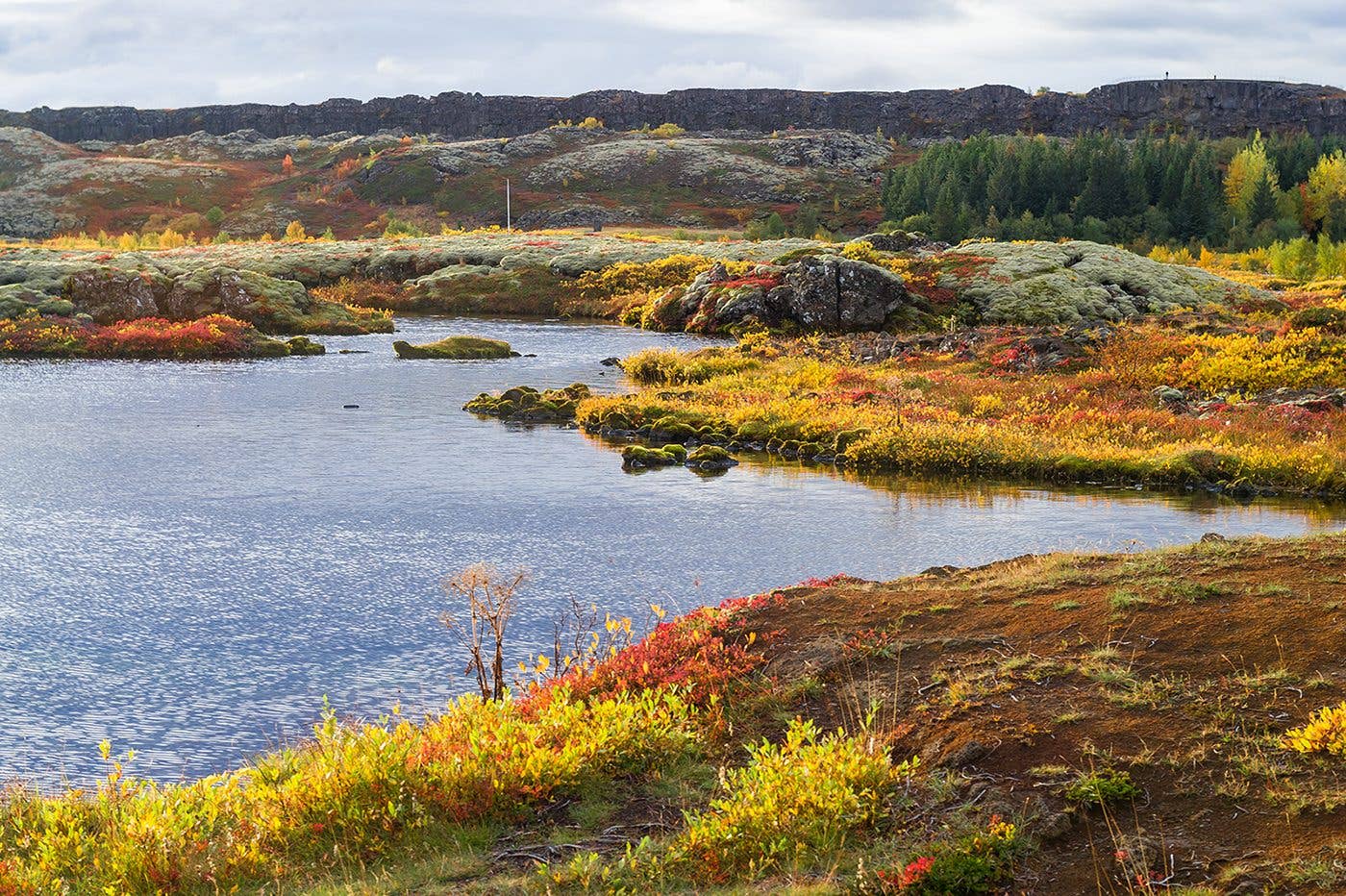 Þingvallavatn, Iceland largest natural lake, stretches across Þingvellir National Park on the Golden Circle.