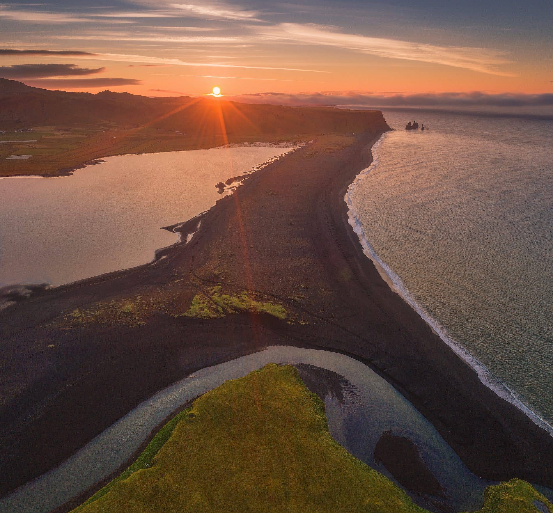 Basalt columns line the Reynisfjara black-sand beach near Vík in South Iceland.