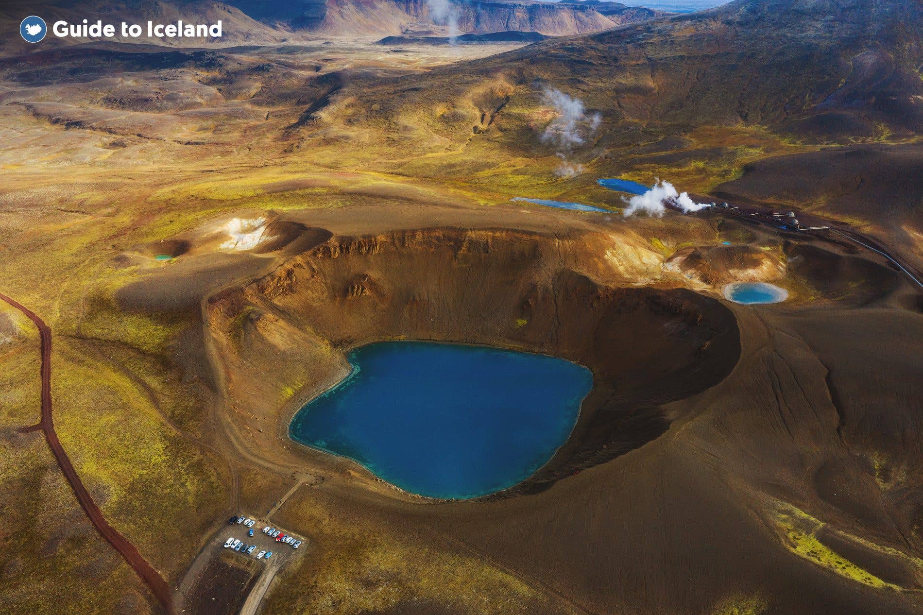 The Víti explosion crater holds a bright blue lake in the Krafla geothermal field, North Iceland.