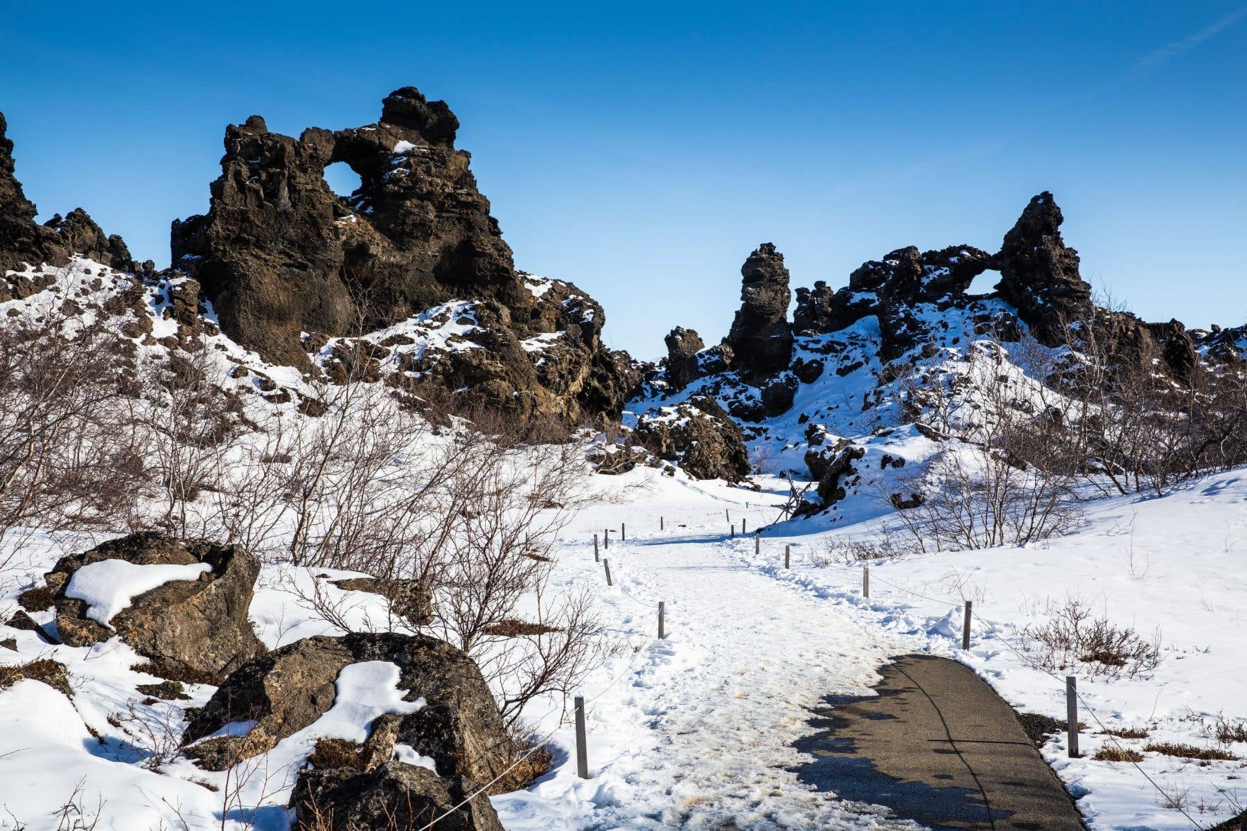 Snow dusts the strange lava pillars of Dimmuborgir near Lake Mývatn in North Iceland.