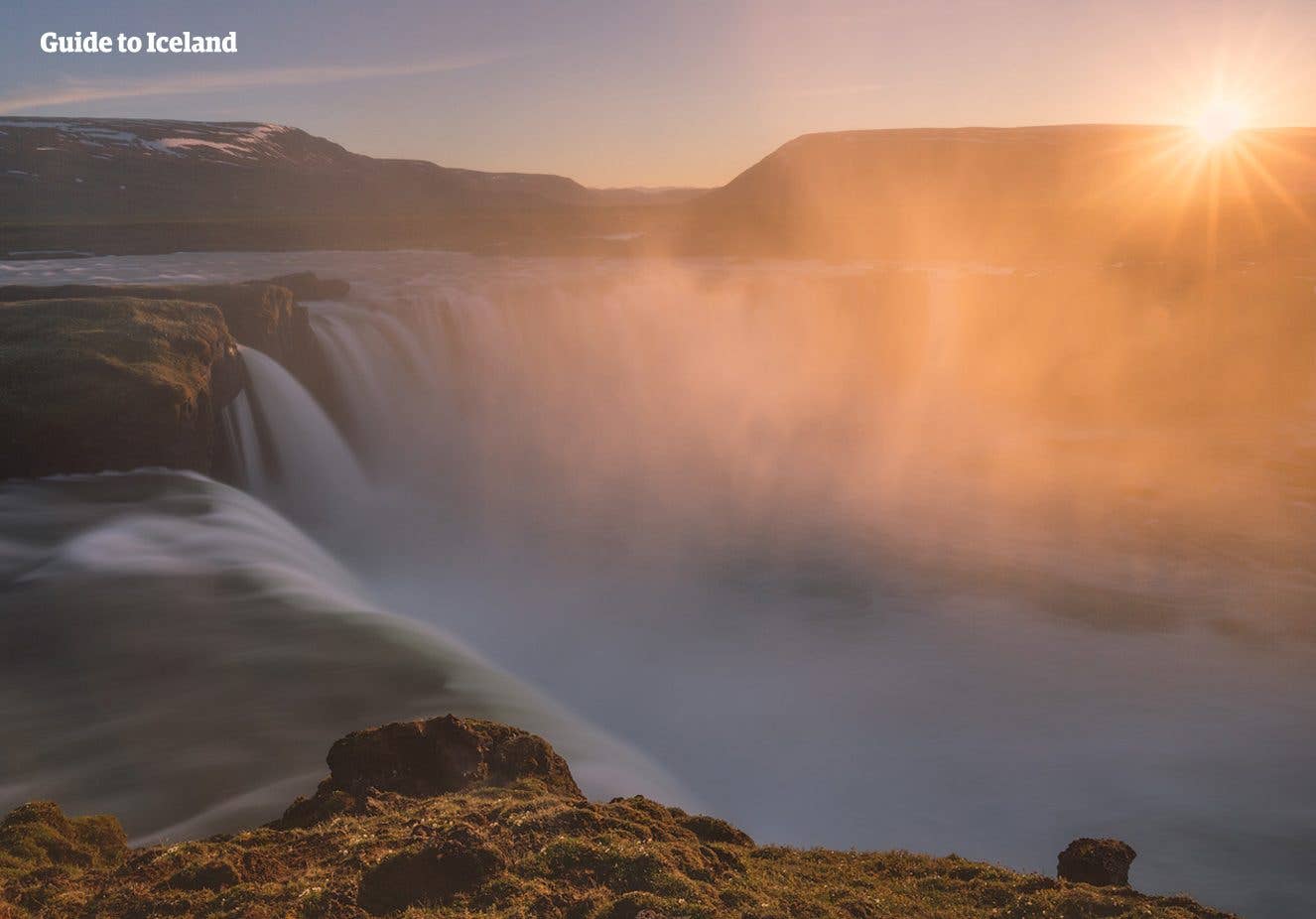 Spray rises from the powerful Goðafoss waterfall in North Iceland.