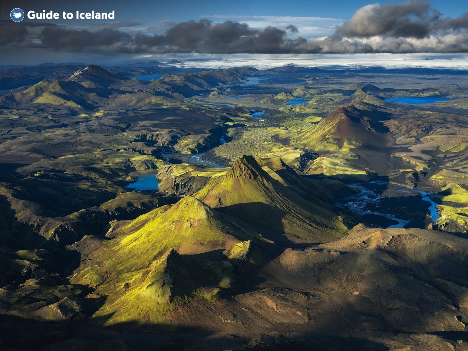 A blue lake sits in a crater of the Lakagígar volcanic fissure in the Icelandic highlands.