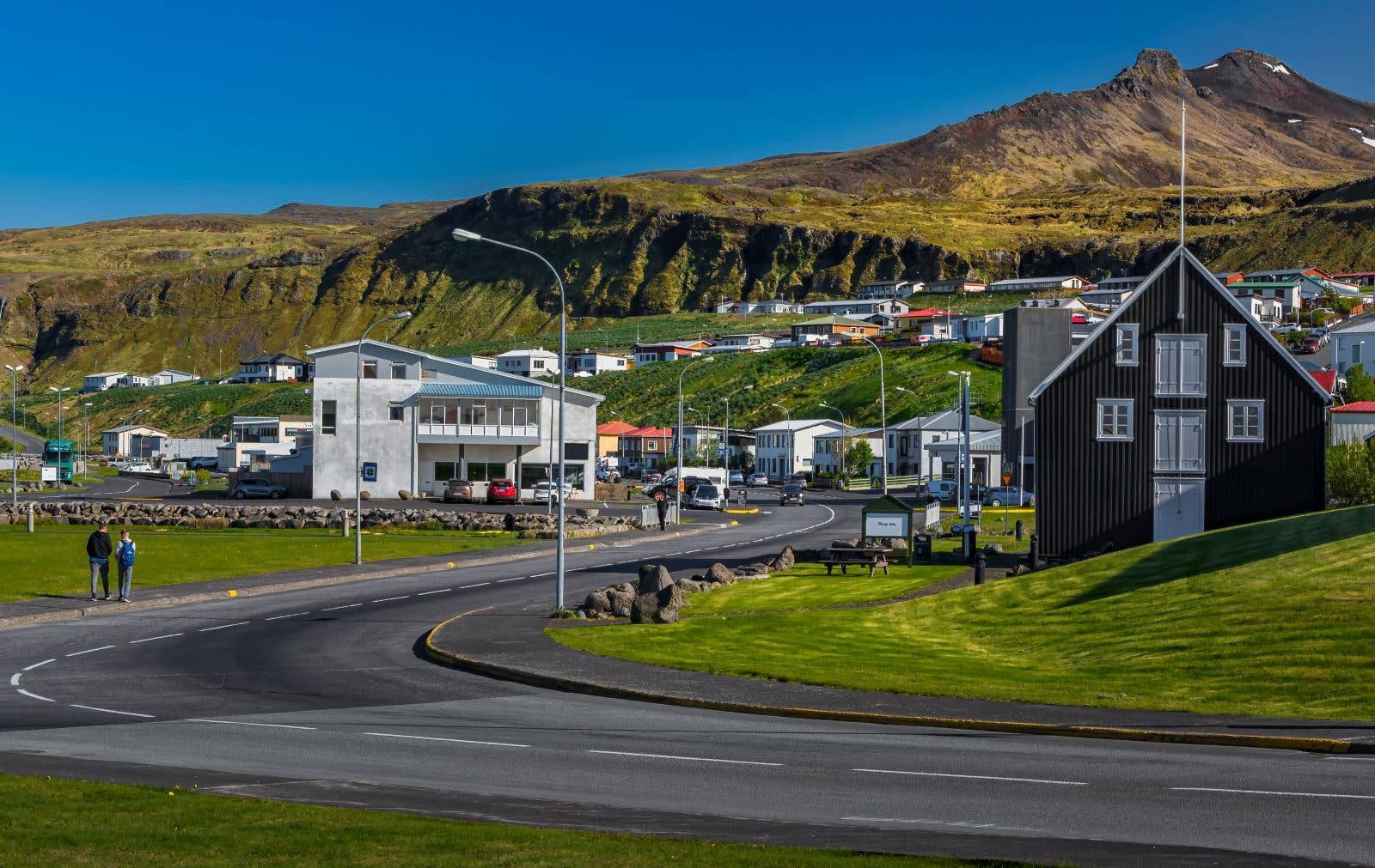 The town of Ólafsvík sits below steep mountains on the Snæfellsnes Peninsula in West Iceland.