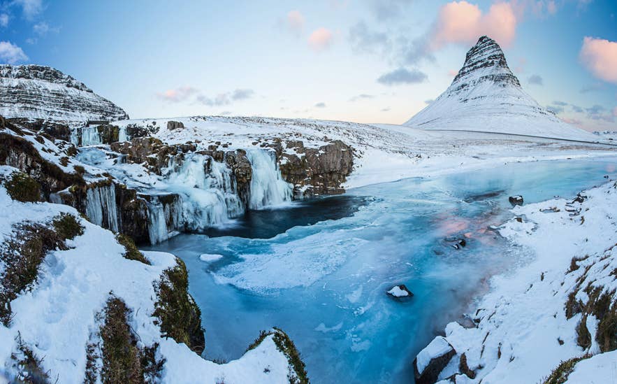 Kirkjufellsfoss waterfall below Mount Kirkjufell on the Snaefellsnes Peninsula in Iceland
