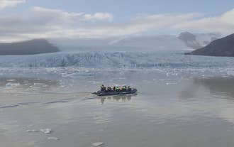 Small Group 4-Hour Iceberg Boat Tour & Glacier Hike Combo at Fjallsarlon