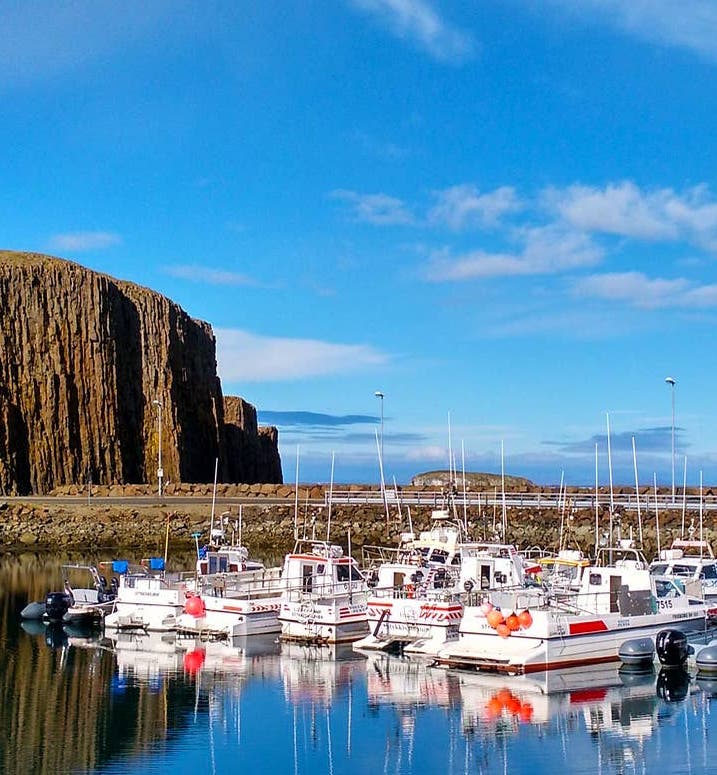 Stykkisholmur highlights a beautiful harbor along a bay in Snaefellsnes Peninsula.