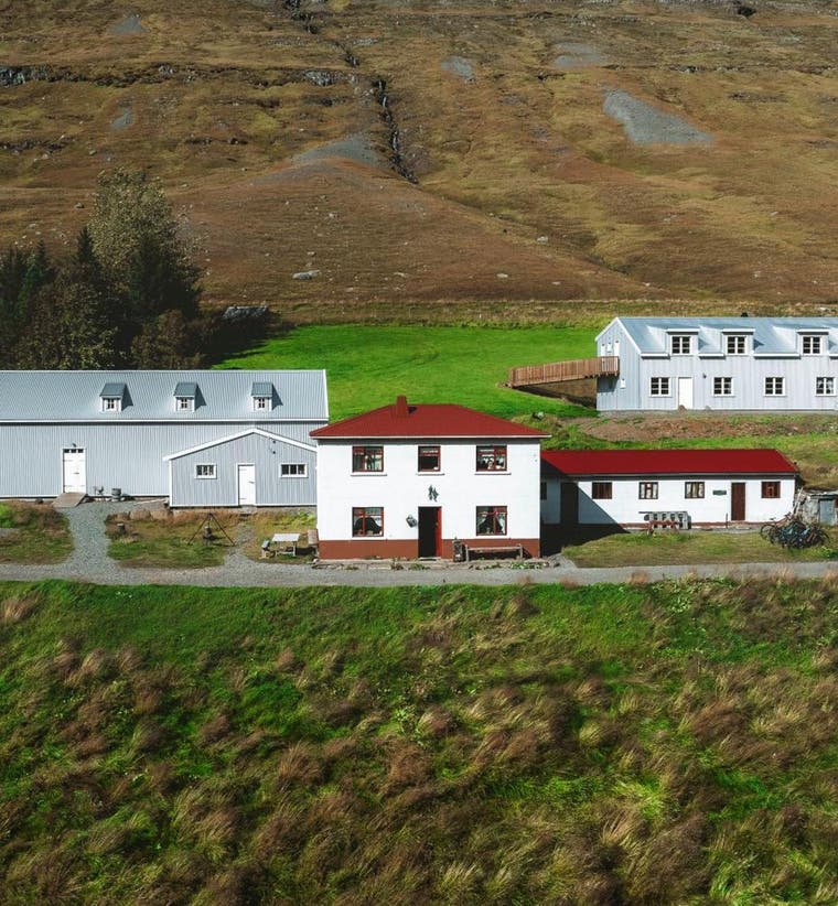 Countryside hotel with mountain views in Iceland under the midnight sun.