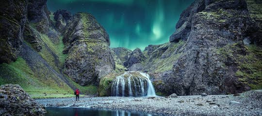 northern-lights-over-stjornarfoss-waterfall-at-kirkjubaejarklaustur.jpg