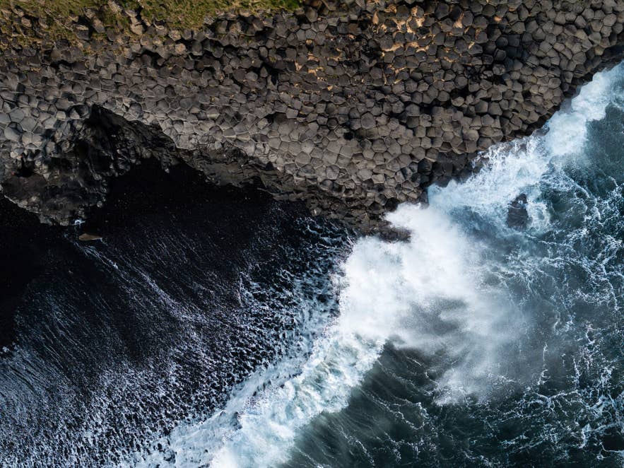 Close view of fine black volcanic sand at Reynisfjara Black Sand Beach