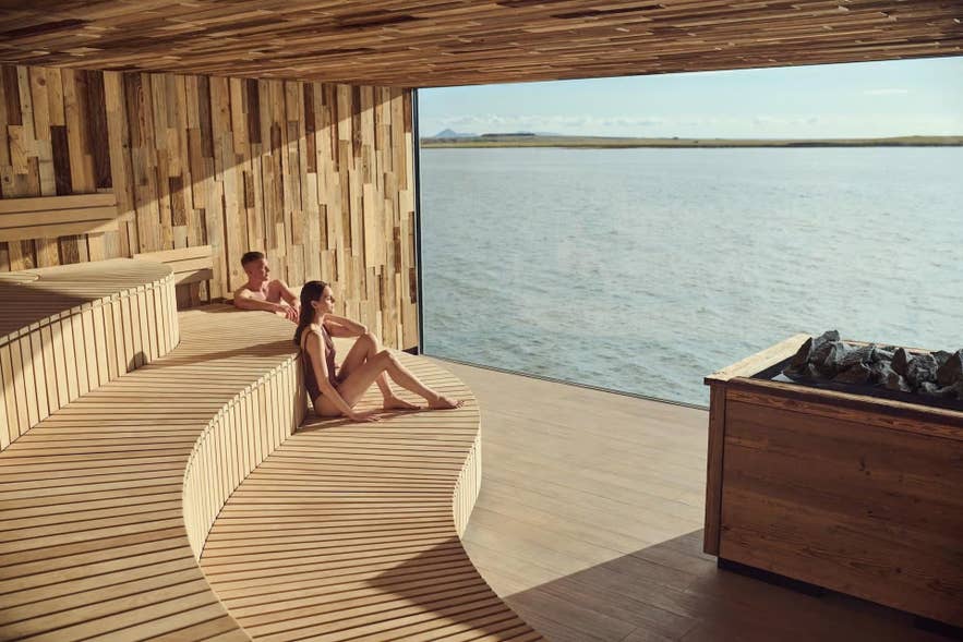 Bathers in the warm geothermal water at Sky Lagoon in Kopavogur, Iceland.