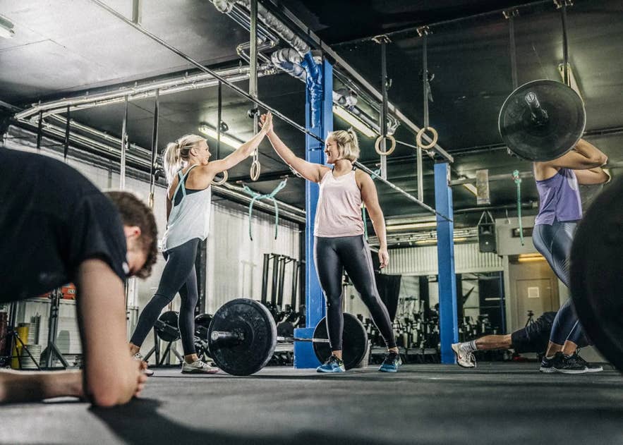 Free weights and training equipment on the floor of a gym in Reykjavik.