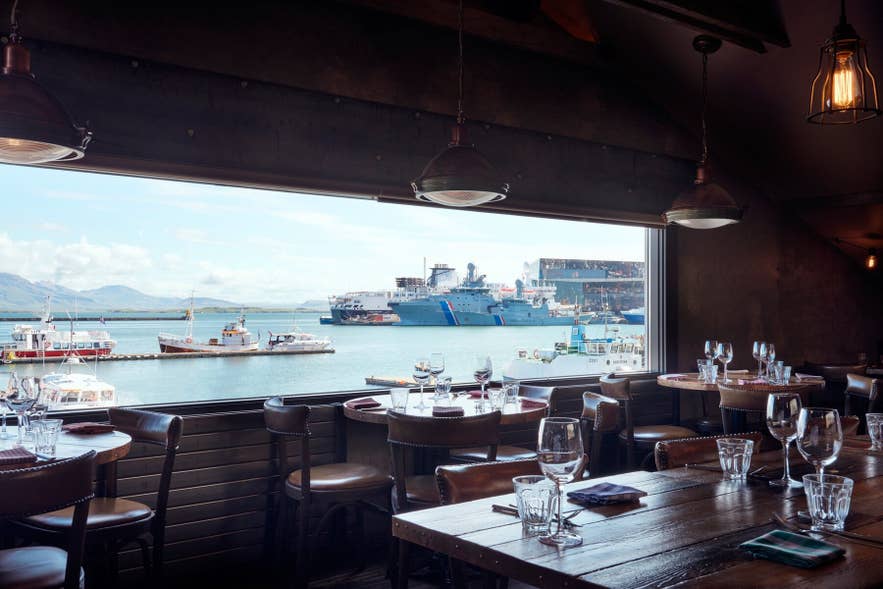Dining room at Kopar Restaurant overlooking Reykjavik’s Old Harbor.