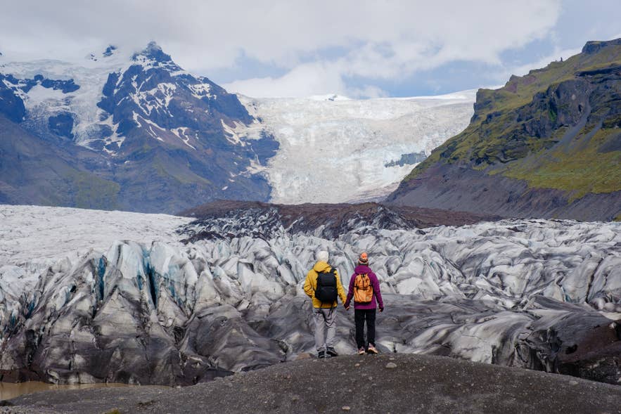 Travelers on a guided glacier hiking tour in Iceland.