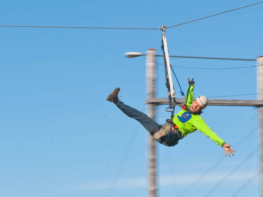 Rider on the zipline at Adrenalin Adventure Park, Nesjavellir, Iceland