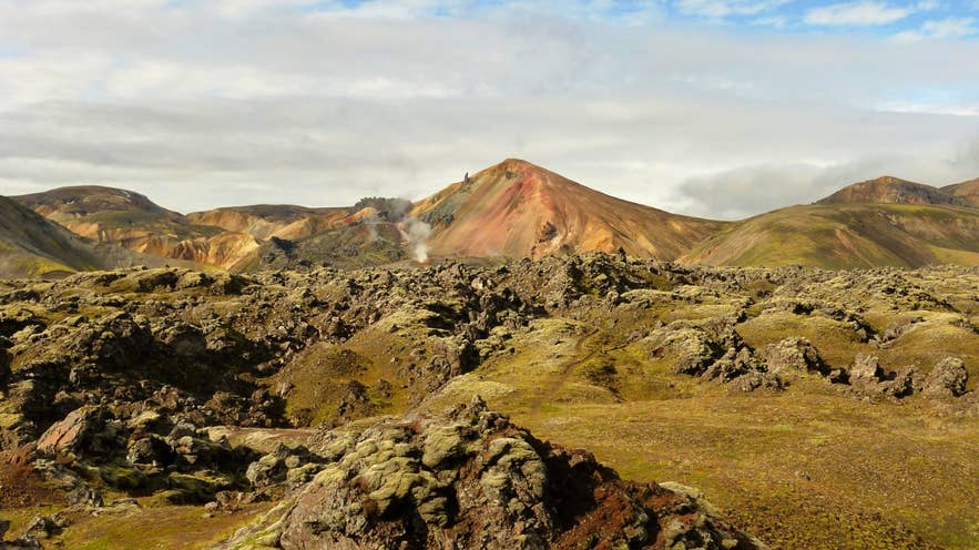 Laugahraun lava field with the coloured east face of Brennisteinsalda behind, Landmannalaugar Laugahraun lava field with the coloured east face of Brennisteinsalda behind, Landmannalaugar