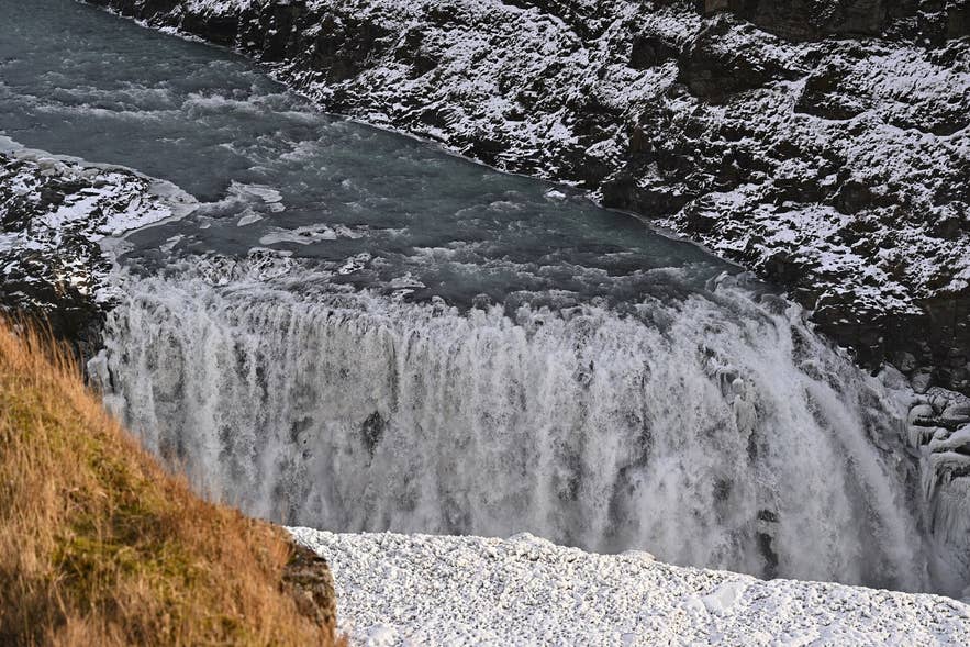 Lower fall of Gullfoss plunging into the narrow Gullfossgljúfur canyon in winter Lower fall of Gullfoss plunging into the narrow Gullfossgljúfur canyon in winter