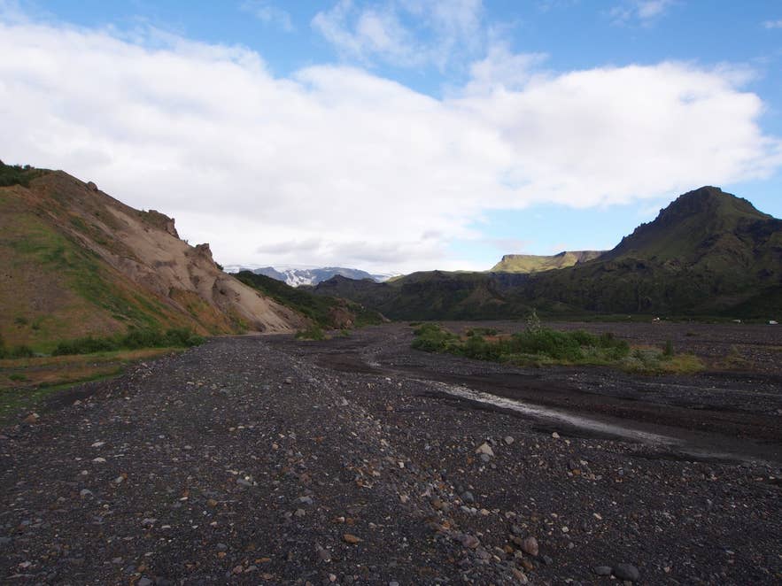 Channels of the glacial river Krossá with glacier ice in the distance