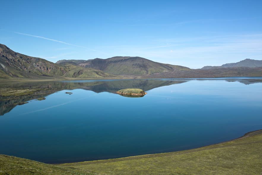 Still water of Frostastaðavatn, the lake below Frostastaðaháls ridge near Landmannalaugar